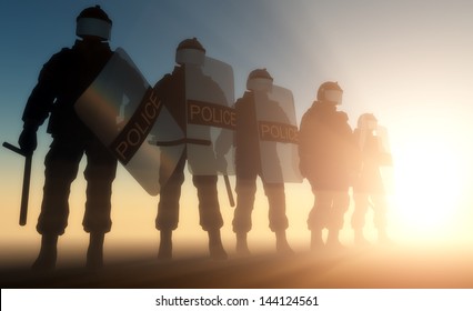 A group of policemen with guns in the sun.