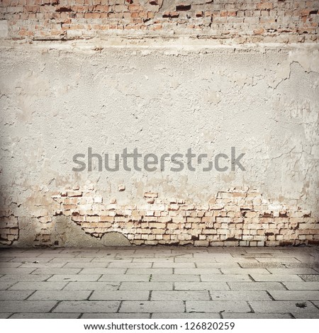 grunge background, red brick wall texture bright plaster wall and blocks road sidewalk abandoned exterior urban background for your concept or project 商業照片 © 