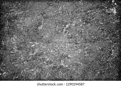 Grunge is black and white. The dark background is covered with dirt, stains and scratches. Worn surface texture pattern