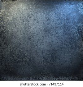 grunge blue and black  background with soft lighting and burnt edges