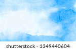 Grunge creative wet ink effect turquoise color watercolor background. Aquarelle painted light sky blue shades frame illustration. Paper textured canvas for vintage design, invitation card, template