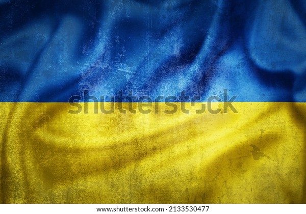 Grunge flag of Ukraine illustration,\
concept of tense relations between Ukraine and\
Russia