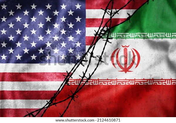 Grunge flags of\
Iran and USA divided by barb wire illustration, concept of tense\
relations between Iran and the\
USA
