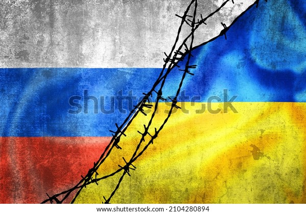 Grunge flags of Russian Federation and Ukraine\
divided by barb wire illustration, concept of tense relations\
between Ukraine and\
Russia