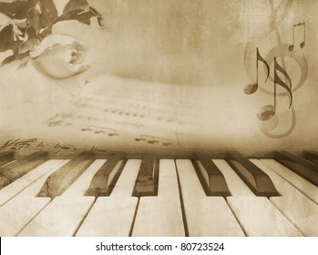 Grunge musical background - piano keys, sheet music and rose - vintage design in sepia tone