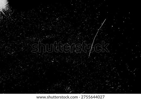 Grunge overlay effect with scratch and dust on black. background, retro noisy grain dust texture for film or photo overlay, old photo overlay texture, black grainy background