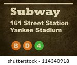 Grunge Yankee Stadium subway train sign isolated on black background.