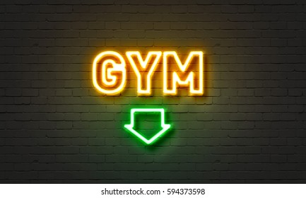 Gym Neon Sign On Brick Wall Background