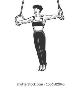 Gymnast Performing Iron Cross On Steady Rings Sketch Engraving Raster Illustration. T-shirt Apparel Print Design. Scratch Board Imitation. Black And White Hand Drawn Image.