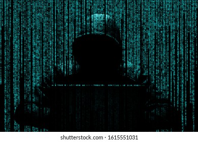 Hacker on the background of binary code