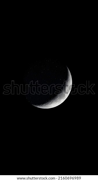 Half moon and the stars on the other half\
beautifully shine. Moonlight. Night\
Sky