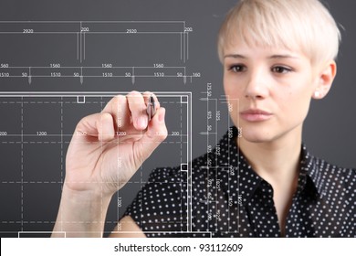 Hand and blueprint - engineer working on blue print concept - Powered by Shutterstock