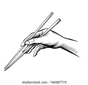 Hand With A Chopsticks