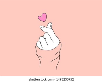 A hand drawing forms a symbol of love in the Korean tradition - Powered by Shutterstock