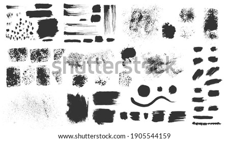 Hand drawn ink design elements. Sponge stamps, dry brush marks, splatter sprinkles, wave, black grungy frames. Set of grunge black artistic brushstroke design elements isolated on white background