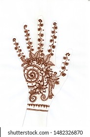 Hand drawn hand with mehndi. Tribal ethnic floral doodle pattern with henna. Isolated on white background.