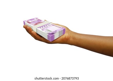 Hand Holding 3D rendered stack of Indian rupee notes isolated on white background