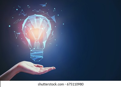 Hand holding abstract glowing polygonal lamp made of connected points on dark background. Knowledge concept. 3D Rendering 