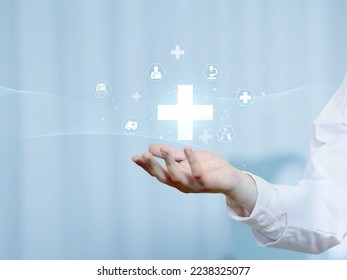 Hand holding plus sign on sky blue background, doctors, medical center and healthcare image. - Shutterstock ID 2238325077