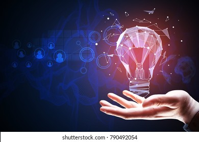 Hand holding polygonal lamp on abstract background. Idea and innovation concept. 3D Rendering  - Powered by Shutterstock