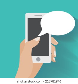 Hand Holing Smartphone With Blank Speech Bubble For Text. Using Smart Phone Similar To Iphon For Text Messaging. Flat Design Concept.