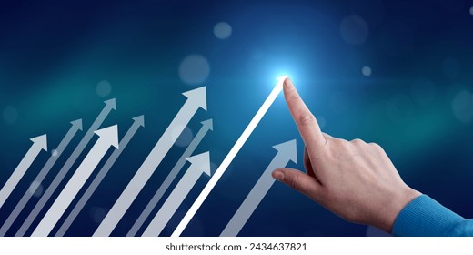 Hand pointing arrow graph corporate future growth. Business development. Success strategy, increase profit and growth concept. - Powered by Shutterstock