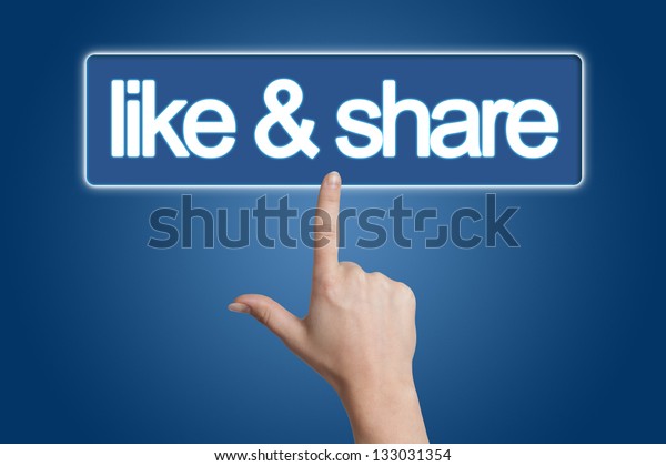 Hand pressing like & share button\
isolated on blue\
background