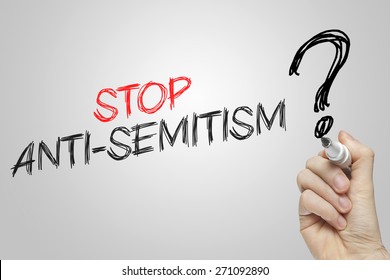 Hand Writing Stop Antisemitism On Grey Background