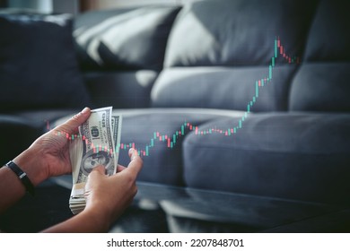 Hands Counting Money US Dollars USD Banknotes Bonus. USD Banknote With Stock Market Chart Graph For Currency Exchange And Global Trade. Financial Graph Up Trend Arrow And Dollar Sign On Blue Chart