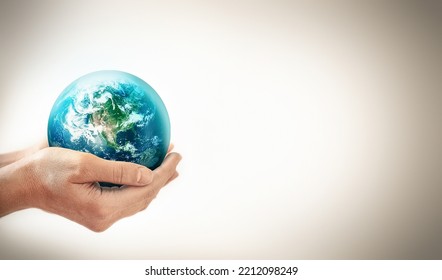 Hands Holding Earth - Conceptual Image Of The Earth Day, Saving Energy, Protecting The Environment. Elements Of This Image Furnished By NASA - Powered by Shutterstock