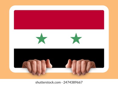 Hands holding a white frame with Syria flag, protest or social issues in Syria, independence day idea, two hands and frame, celebration or campaigning concept - Powered by Shutterstock