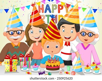 Happy boy blowing birthday candles with his family - Powered by Shutterstock