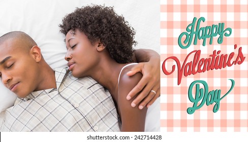 Happy couple sleeping in bed together against happy valentines day - Powered by Shutterstock