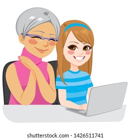 Happy granddaughter helping grandmother using internet with laptop - Powered by Shutterstock