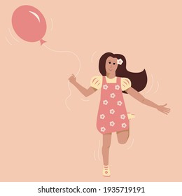 happy little girl with a pink balloon