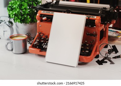 Hardcover Book Near Old Typewriter Mockup. 3D Rendering