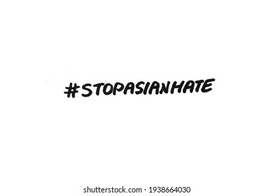 Hashtag Stop Asian Hate Handwritten message on a white background.