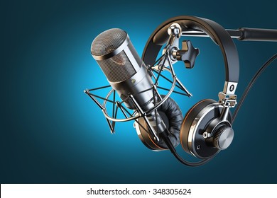 Headphones on microphone stand, professional studio - Powered by Shutterstock