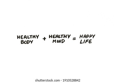 Healthy Body And Healthy Mind Equals Happy Life! Handwritten Message On A White Background.