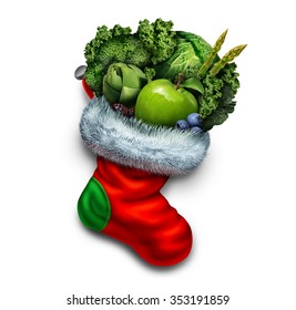 Healthy Holiday Eating And New Year Dieting Resolution As A Group Of Green Vegetables And Fresh Fruit In A Red Christmas Stocking As A Festive Symbol Of A Vegetarian Gift Or Winter Fitness Icon.