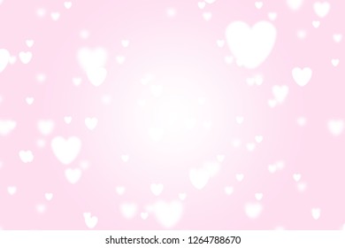 Heart icon bokeh on pink color background for Christmas festival or winter season contents or for wallpaper or paper for contents about winter for love content or valentine day or for wallpaper.
