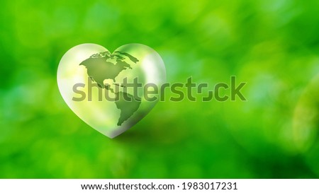 Heart shape earth map on blurred bokeh background, Love and Save the World for the Next Generation concept, Green world day concept