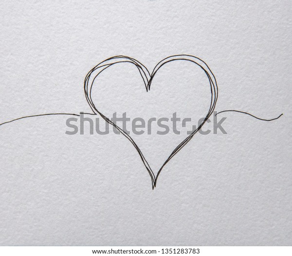 Heart shape Love handwritten Tangled grungy\
round scribble hand drawn with thin line, divider shape on white\
background paper\
illustration