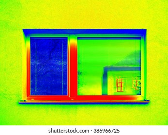 The heat loss of modern plastic sandwich frame window in flat house. Thermography measurement scan. Thermal waste map.
