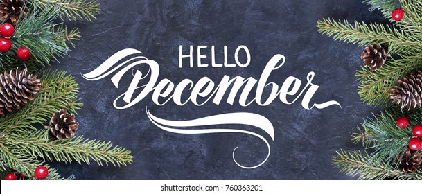 Hello December hand lettering. Spruce branches and cones frame. Great season texture with december and winter mood. - Powered by Shutterstock