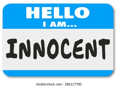 Hello I Am Innocent words written on a name tag or sticker badge to illustrate you are good and pure, or acquitted in a court of law