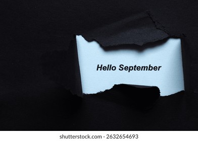 hello september write on black and white background 