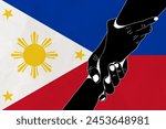 Helping hand against the Philippines flag. The concept of support. Two hands taking each other. A helping hand for those injured in the fighting, lend a hand