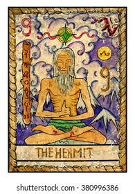 The hermit. Full colorful deck, major arcana. The old tarot card, vintage hand drawn engraved illustration with mystic symbols. Old man sitting on cloud in lotus yoga pose against mountain background