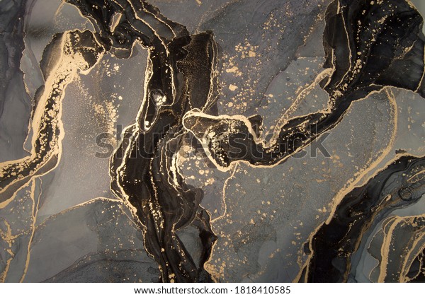 High resolution. Luxury abstract fluid art painting in\
alcohol ink technique, mixture of black, gray and gold paints. \
Imitation of marble stone cut, glowing golden veins. Tender and\
dreamy design. 